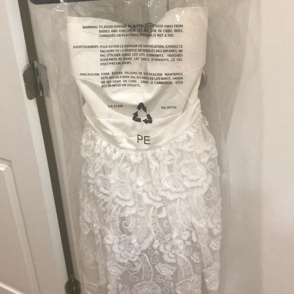 BCBG white romper with skirt overlay